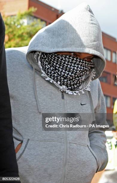 Ziaur Rahman leaves Luton Magistrates Court in Luton, Bedfordshire.