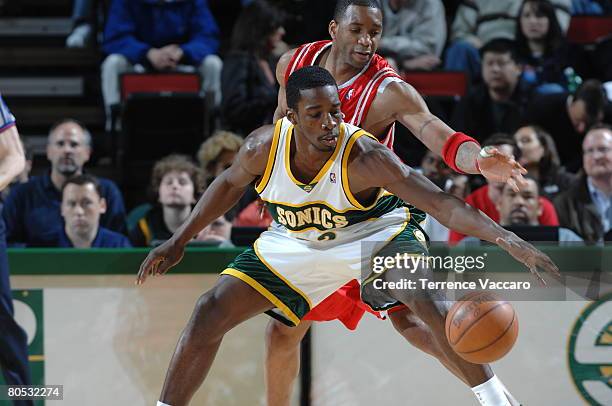 Jeff Green of the Seattle SuperSonics prepares to make a move against Tracy McGrady of the Houston Rockets on April 4, 2008 at the Key Arena in...