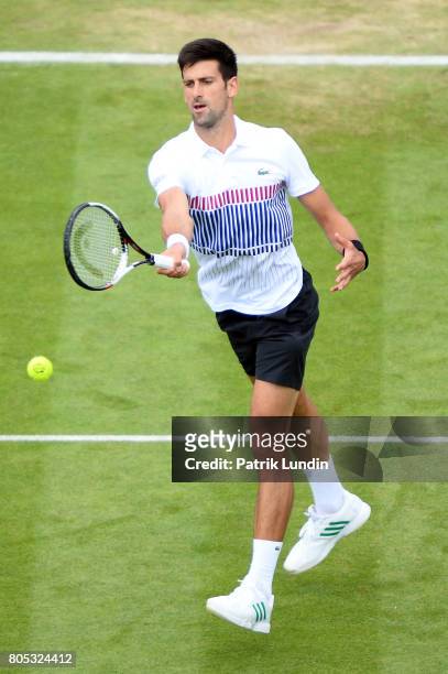 Novak Djokovic of Serbia hits a forehand during the Final match against Gael Monfils of Franceon day seven during the Aegon International Eastbourne...