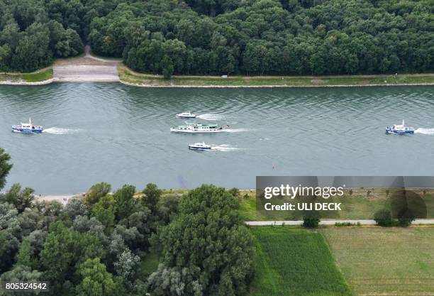 Aerial view shows the MS Mainz shipping on the Rhine river with the coffin of late former Chancellor Helmut Kohl onboard on its way to Speyer ahead...