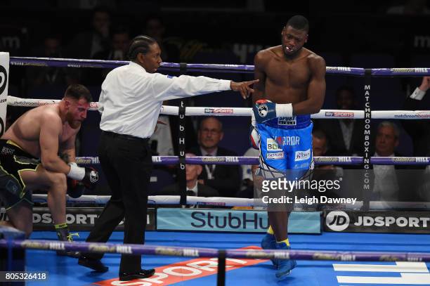 Isaac Chamberlain knocks down Ryan Crawford at The O2 Arena on July 1, 2017 in London, England.