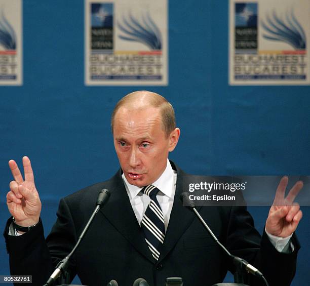 Russian President Vladimir Putin speaks during a press conference after the NATO-Russia Council meeting at the end of the NATO summit on April 4,...