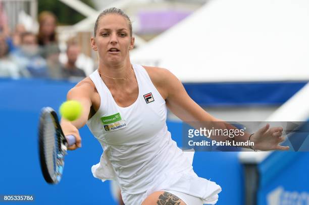 Karolina Pliskova of Czech Republic hits a forehand during the Final match against Caroline Wozniacki of Denmarkon day seven on July 1, 2017 in...