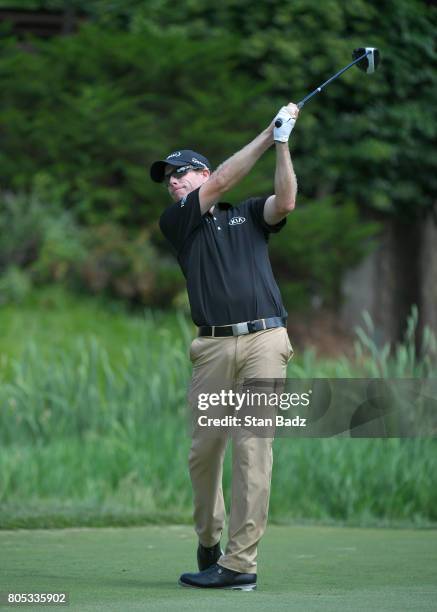 David Hearn of Canada hits a drive on the sixth hole during the third round of the Quicken Loans National at TPC Potomac at Avenel Farm on July 1,...