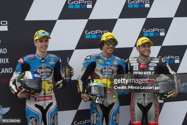 Alex Marquez of Spain and EG 00 Marc VDS, Franco Morbidelli of Italy and EG 00 Marc VDS and Sandro Cortese of Germany and Dynavolt Intact GP smile...