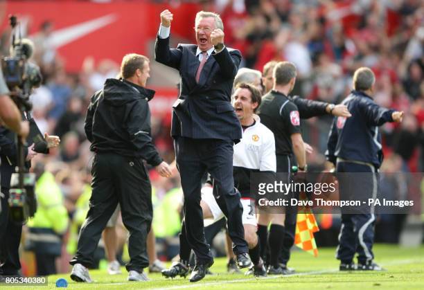 Manchester United manager Sir Alex Ferguson celebrates after Michael Owen scored the winning goal during the Barclay's Premier League match at Old...