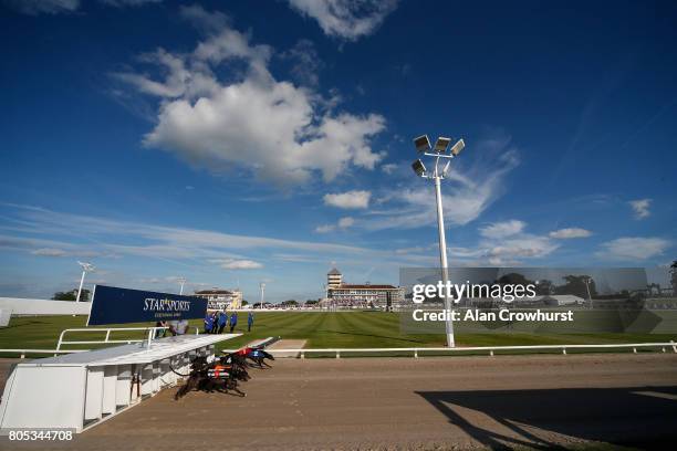 General view as runners leave the traps from the 260 metre start at Towcester greyhound track on July 1, 2017 in Towcester, England.