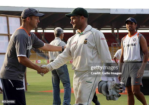 Gary Kirsten congratulates Mark Boucher of South Africa on their win during Day 3 of the second test match between India and South Africa held at...