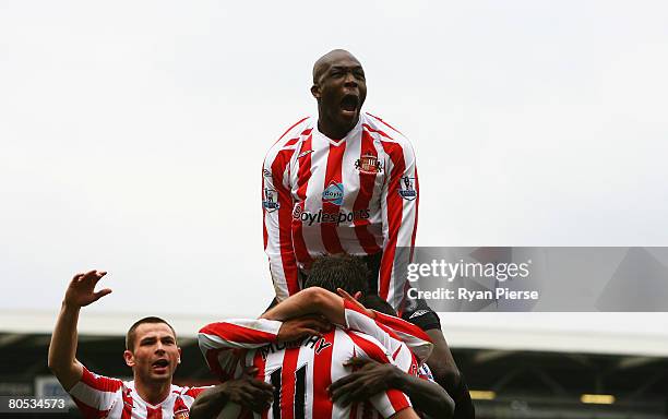 Nyron Nosworthy of Sunderland celebrates the goal scored by Michael Chopra of Sunderland with team mates during the Barclays Premier League match...