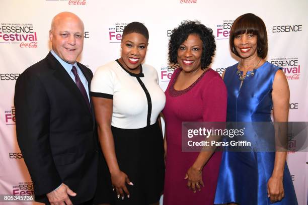 Mayor Mitchell Landrieu, Symone Sanders, Mayor Sharon Weston Broome and Mayor Catherine E. Pugh pose backstage at the 2017 ESSENCE Festival presented...