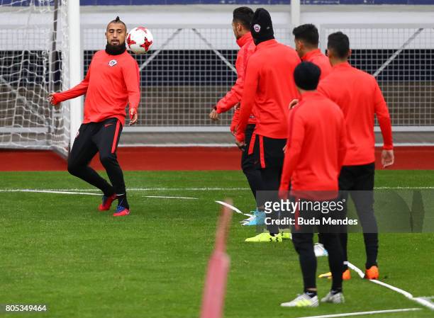 Arturo Vidal controls the ball during a Chile training session ahead of their FIFA Confederations Cup Russia 2017 final against Germany at Smena...