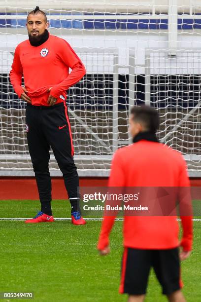 Arturo Vidal looks on during a Chile training session ahead of their FIFA Confederations Cup Russia 2017 final against Germany at Smena Stadium on...