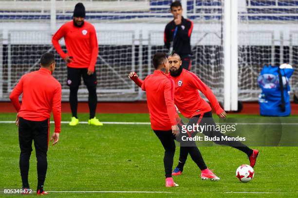 Arturo Vidal fights the ball during a Chile training session ahead of their FIFA Confederations Cup Russia 2017 final against Germany at Smena...