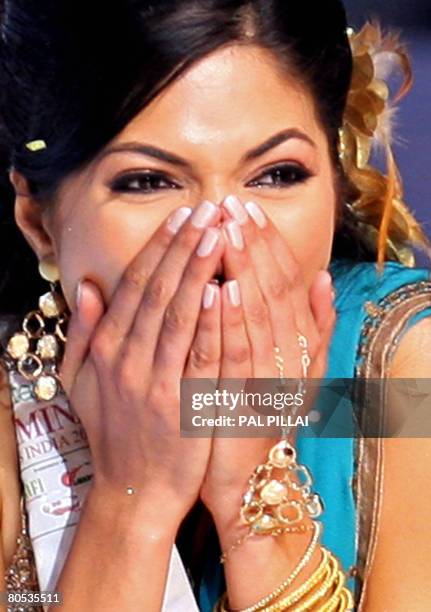 Newly crowned beauty pageant entrants Miss India World Parvathy Omanakuttan reacts as she wins the Miss India pageant contest on April 5, 2008 in...