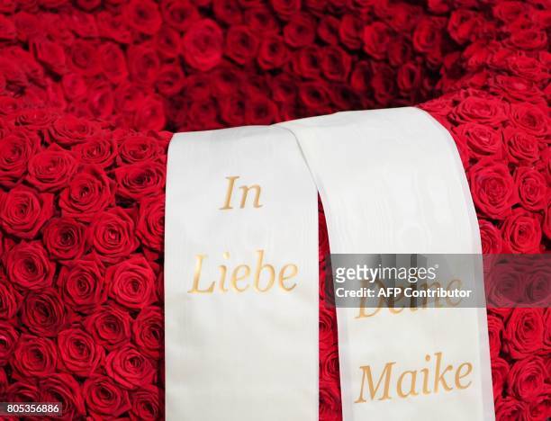 Wreath of roses from the widow of the late former Chancellor Helmut Kohl Maike Kohl-Richter, is pictured in the cathedral in Speyer on July 1, 2017....