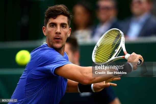 Thanasi Kokkinakis of Australia hits a backhand during his match against Damir Dzumhur of Bosnia and Herzegovina day five of The Boodles Tennis Event...