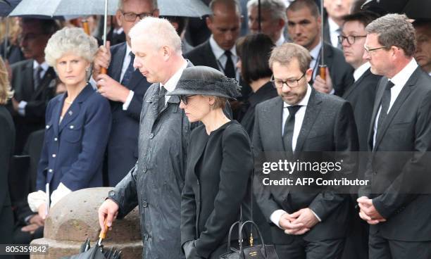 Widow of former German Chancellor Helmut Kohl, Maike Kohl-Richter, and former editor-in-chief of Germany's tabloid "Bild" Kai Diekmann pay respect to...