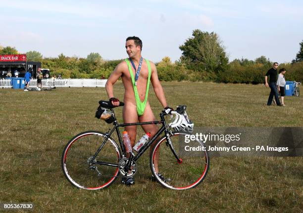 Richard Sarsfield, from London, and a member of Team MSIG, sports a mankini as he completes the Prince's Trust Palace to Palace charity cycle ride....