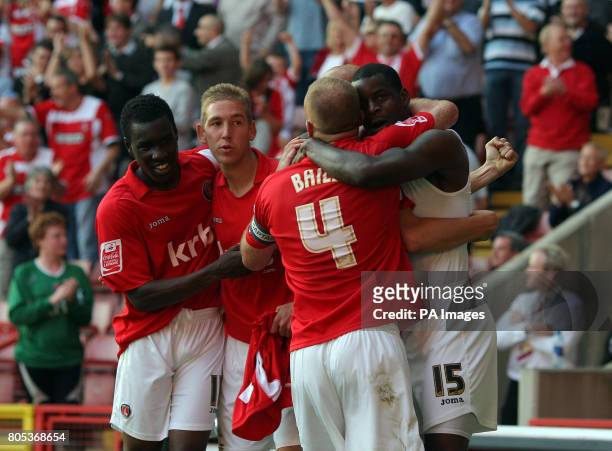 Charlton Athletic's Izale McLeod celebrates scoring the 2nd Charlton goal with teammates during the Coca-Cola League One match at The Valley,...