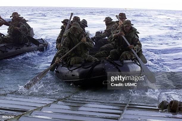 Marines from Battalion Landing Team 2/2's Golf Company launch their Combat Rubber Reconnaissance Crafts September 26, 2000 from the well deck of USS...