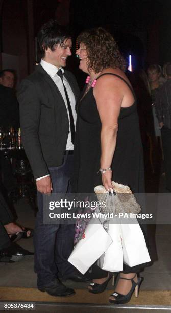 Cheryl Fergison and Adam Croasdell from Eastenders leave the Inside Soap awards in London.