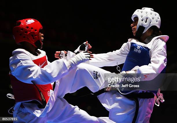 Diana Lopez and Nia Abdallah fight during the Taekwando Olympic Trials at the Veterans Memorial Auditorium on April 5, 2008 in Des Moines, Iowa....