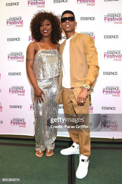 Ta'Rhonda Jones and Bryshere Y. Gray pose in the press room at the 2017 ESSENCE Festival presented by Coca-Cola at Ernest N. Morial Convention Center...