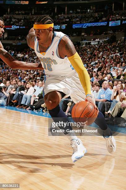 Carmelo Anthony of the Denver Nuggets goes to basket against the Sacramento Kings on April 5, 2008 at the Pepsi Center in Denver, Colorado. NOTE TO...