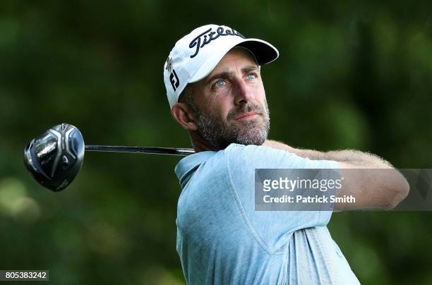 Geoff Ogilvy of Australia plays his shot from the eighth tee during the third round of the Quicken Loans National on July 1, 2017 TPC Potomac in...