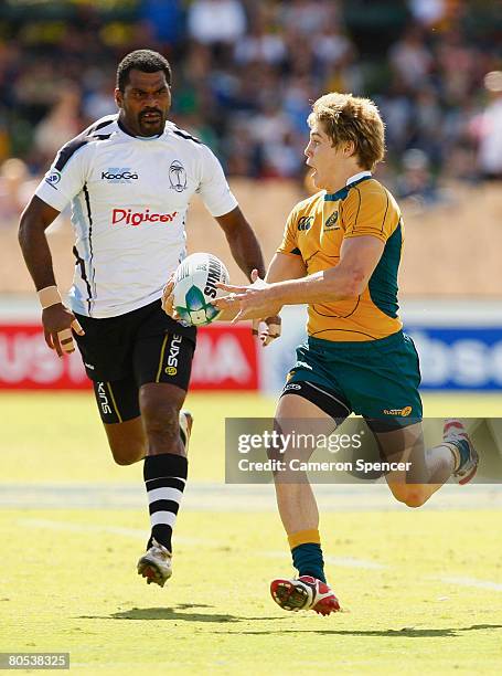 James O'Connor of Australia runs the ball during the quarter final bowl match between Australia and Fiji during day two of the 2008 Adelaide Sevens...