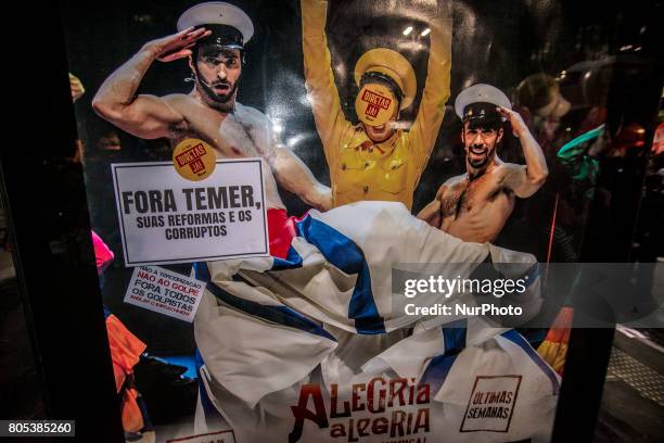 Members of the Roofless Movement call for Brazilian President Michel Temer to step down and protest against his proposed economic reforms, at...