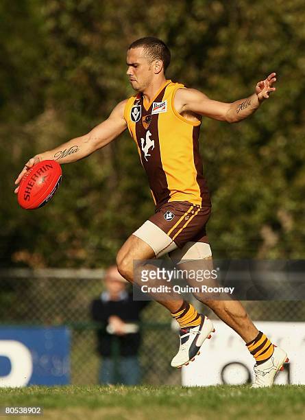 Mark Williams of the Hawks kicks during the round two VFL match between the Box Hill Hawks and Tasmania at Box Hill City Oval on April 6, 2008 in...