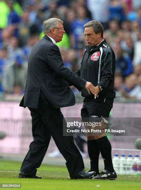 Manchester United manager Alex Ferguson vents his frustration towards fourth official Alan Wiley