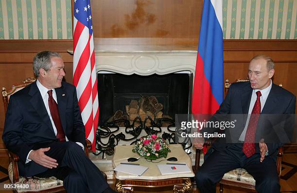 President George W. Bush speaks during a meeting with Russian President Vladimir Putin on April 06, 2008 at the State Residence of the President of...