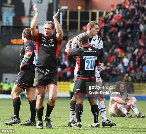 Richard Hill of Saracens, the Man of the match, applauds the fans following his team's 19-10 victory during the Heineken Cup Quarter Final match...