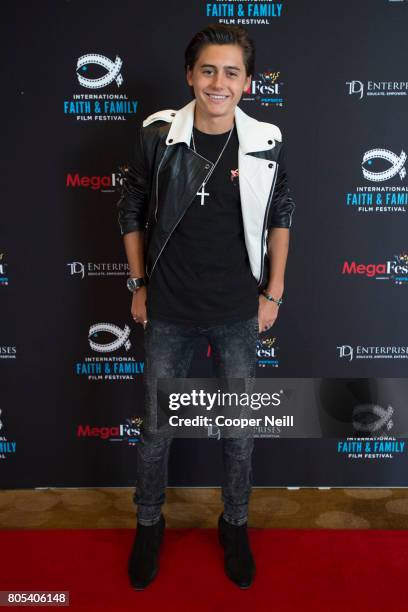 Isaak Presley poses for a photo at the Hollywood's Millennials: International Faith & Family Film Festival Rising Stars panel during MegaFest at Omni...