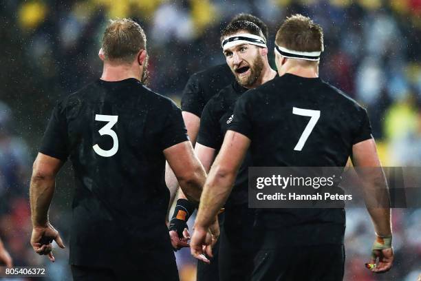 Kieran Read of the All Blacks talks to Owen Franks and Sam Cane during the International Test match between the New Zealand All Blacks and the...