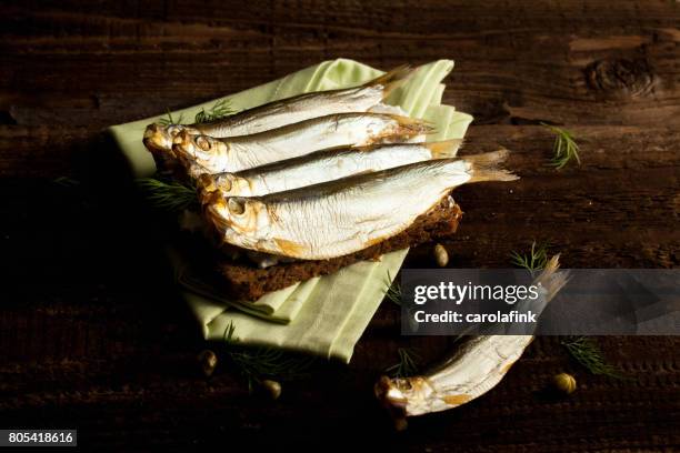 german sprats on bread - carolafink stock pictures, royalty-free photos & images