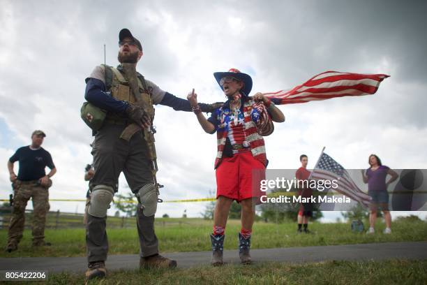 Helena Rodriguez speaks with a member of the Delaware Militia at the Gettysburg National Military Park on July 1, 2017 in Gettysburg, Pennsylvania....