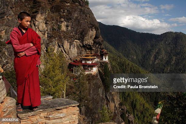 Dorji takes in the views after walking from the Taktshang monastery April 3, 2008 outside of Paro, Bhutan. Dorji is one of a handful of monks living...