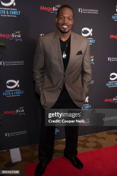 Stallings poses for a photo before a screening of 'A Question of Faith' during the MegaFest International Faith & Family Film Festival at Omni Hotel...