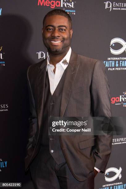 Dr. Cameron Lewis poses for a photo before a screening of 'A Question of Faith' during the MegaFest International Faith & Family Film Festival at...