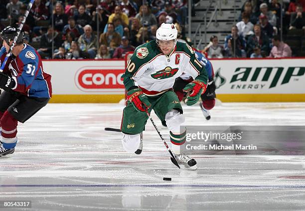 Marian Gaborik of the Minnesota Wild skates with the puck against the Colorado Avalanche at the Pepsi Center on April 6, 2008 in Denver, Colorado.