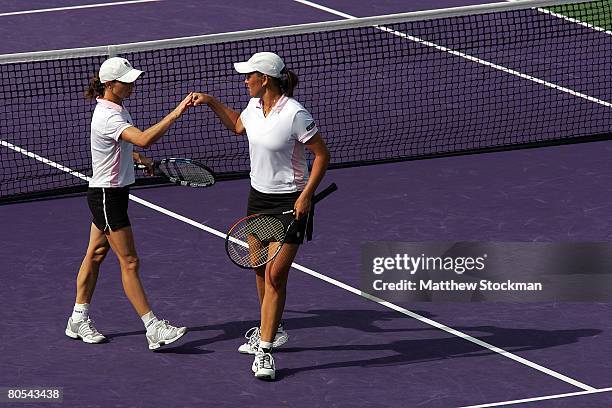 Cara Black and Liezel Huber play against Katarina Srebotnik and Ai Sugiyama during the women's doubles final on day fourteen of the Sony Ericsson...