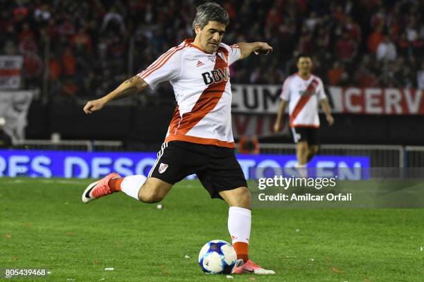 Ariel Ortega kicks the ball during Fernando Cavenaghi's farewell match at Monumental Stadium on July 01, 2017 in Buenos Aires, Argentina.