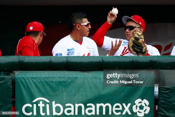 Ricardo Valenzuela of Diablos catches a foul ball during the match between Rojos del Aguila and Diablos Rojos as part of the Liga Mexicana de Beisbol...