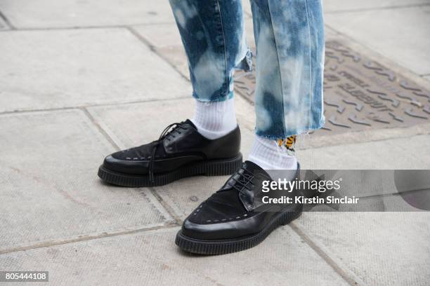 Online fashion editor Dean Nguyen wears Asos shoes on day 1 of London Collections: Men on June 9, 2017 in London, United Kingdom.