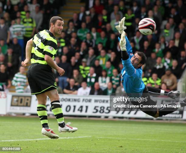 Celtic's Scott McDonald watches as St Mirren's goalkeeper Paul Gallacher dives to save his effort on goal