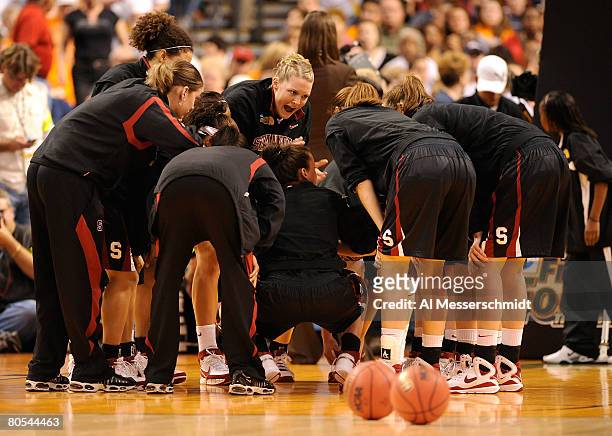 Jayne Appel of the Stanford Cardinal fires her team up in a huddle against the UCONN Huskies during their National Semifinal Game of the 2008 NCAA...