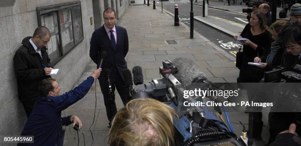 Detective Chief Inspector Mickey Gallagher reads a statement outside the Old Bailey, London, after Dr Edward Erin was found guilty of attempting to...